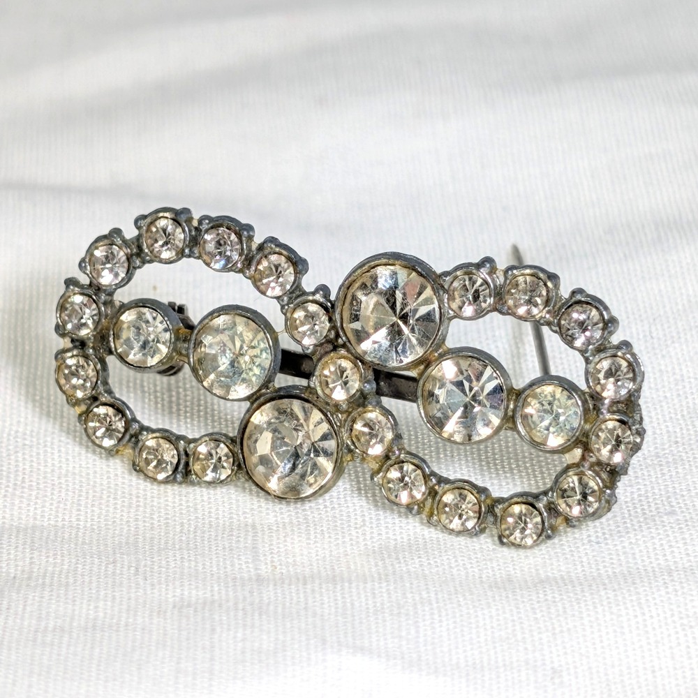 Vintage Art Deco Rhinestone Infinity Brooch Pot Metal Clear Crystal Pin 1.75"